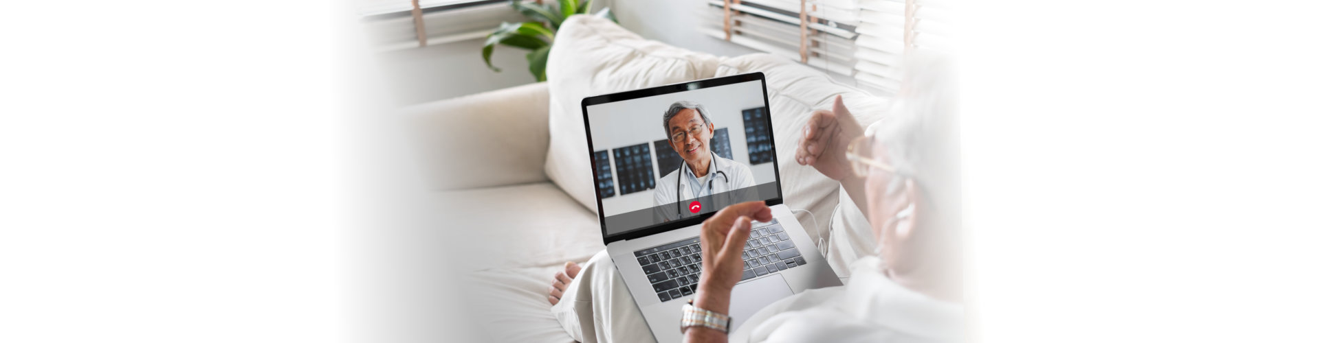 elderly man talking to a doctor