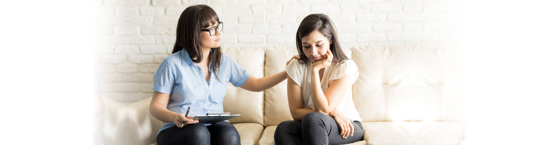 woman feeling despair while talking to her psychiatrist