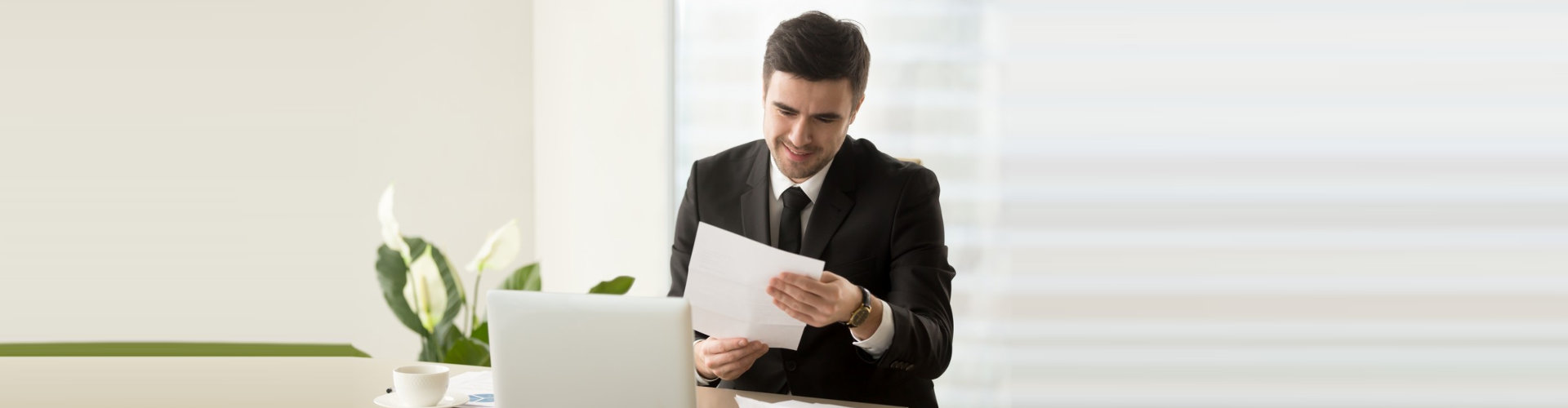 man reading documents