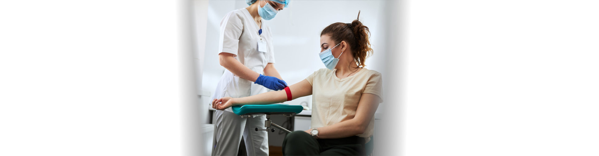 nurse getting blood sample from the patient